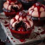 Easy Halloween food ideas : Vampire Bite Halloween Cupcakes: A Spooky Delight with a Deliciously Sinister Twist