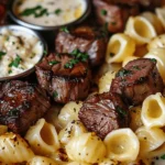 Steak Bites and Shell Pasta in Garlic Butter Alfredo Sauce