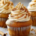 Indulge in Cream-Filled Pumpkin Cupcakes This Fall